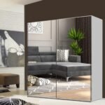 White full mirror sliding door wardrobe in modern bedroom
